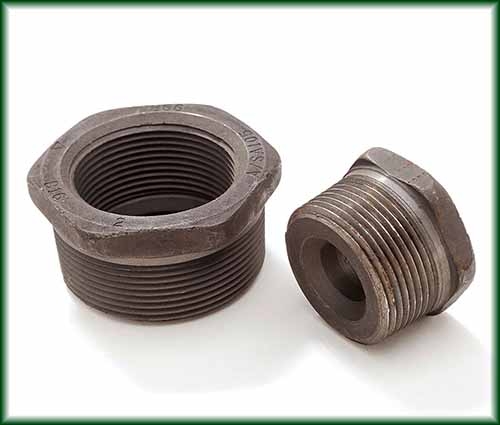 Two Forged Steel Hex Bushings.